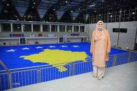 Kosovo Woman Aims for Guinness Record with Origami Flag