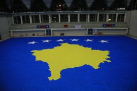 Kosovo Woman Breaks Guinness World Record with Origami Flag